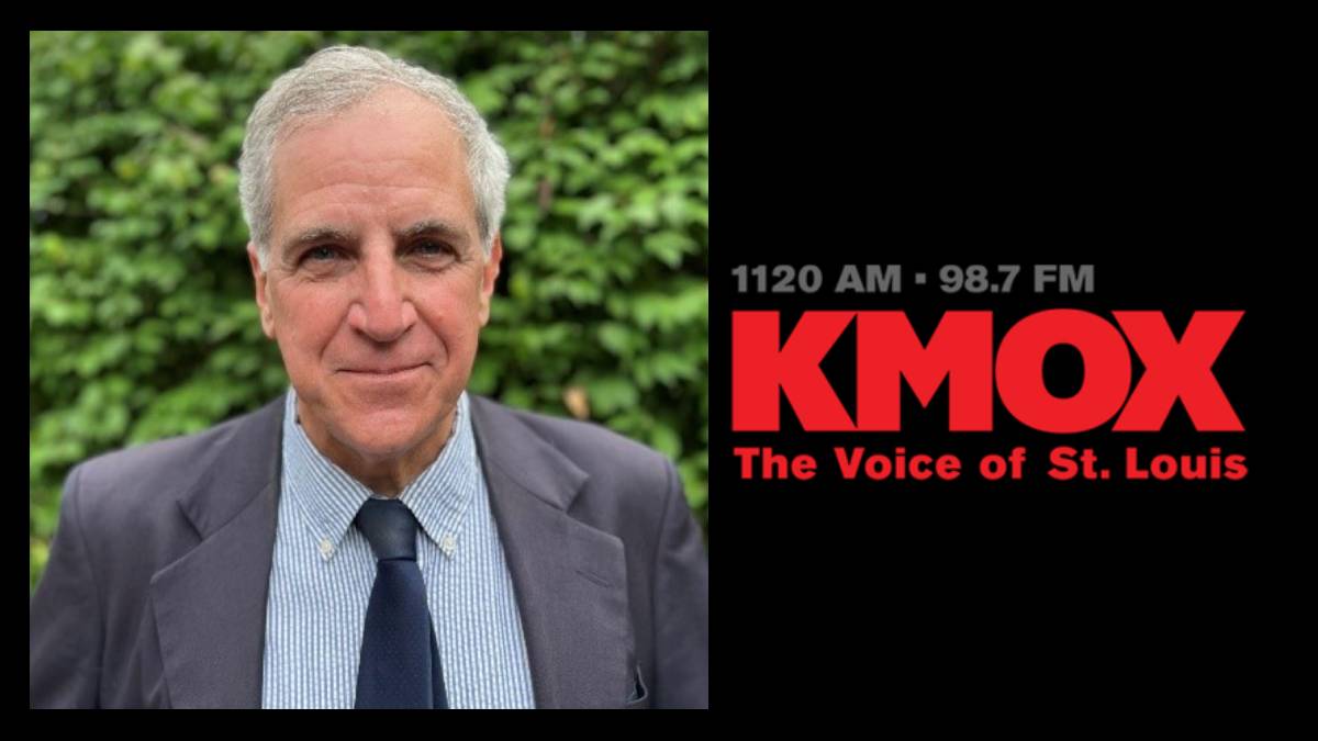 A photo of Kevin Killeen and the KMOX logo