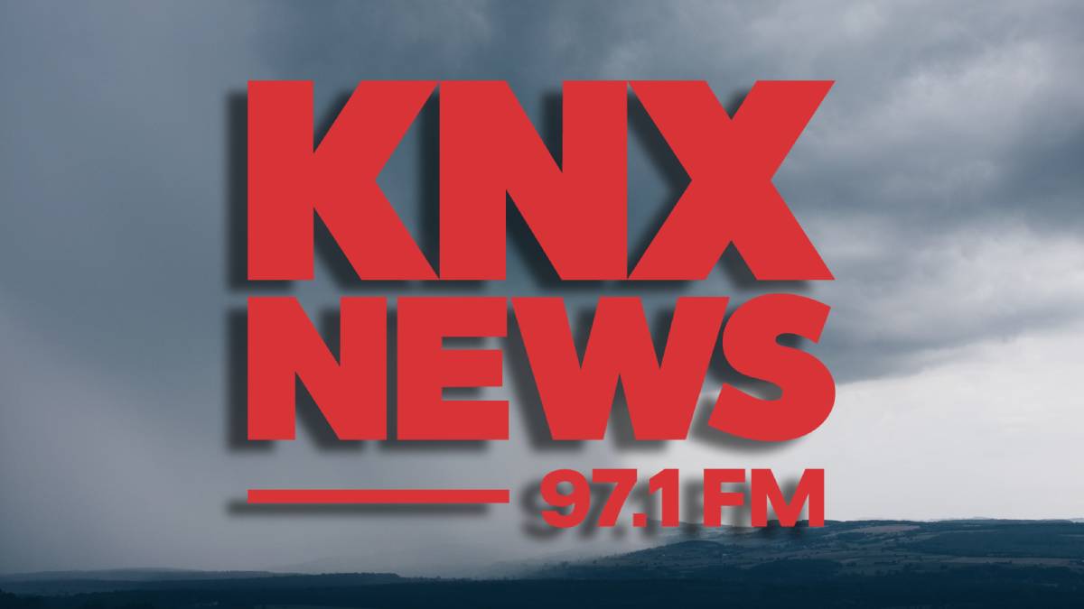 A photo of the KNX News logo and a tropical storm