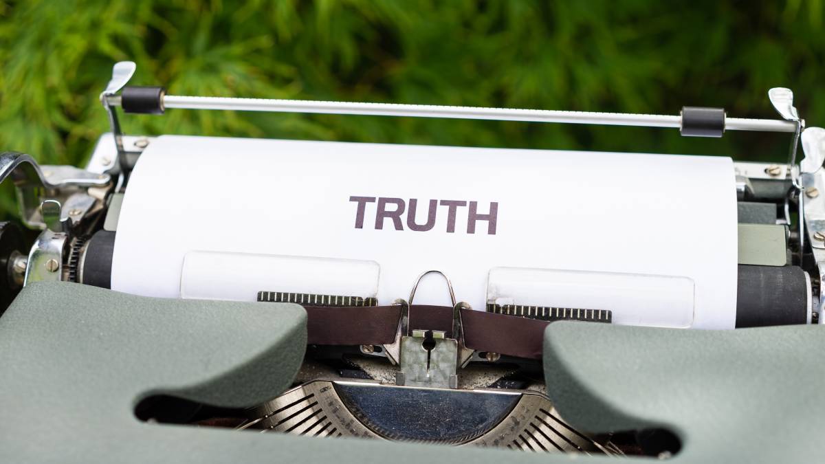 A photo of the word Truth written on a typewriter