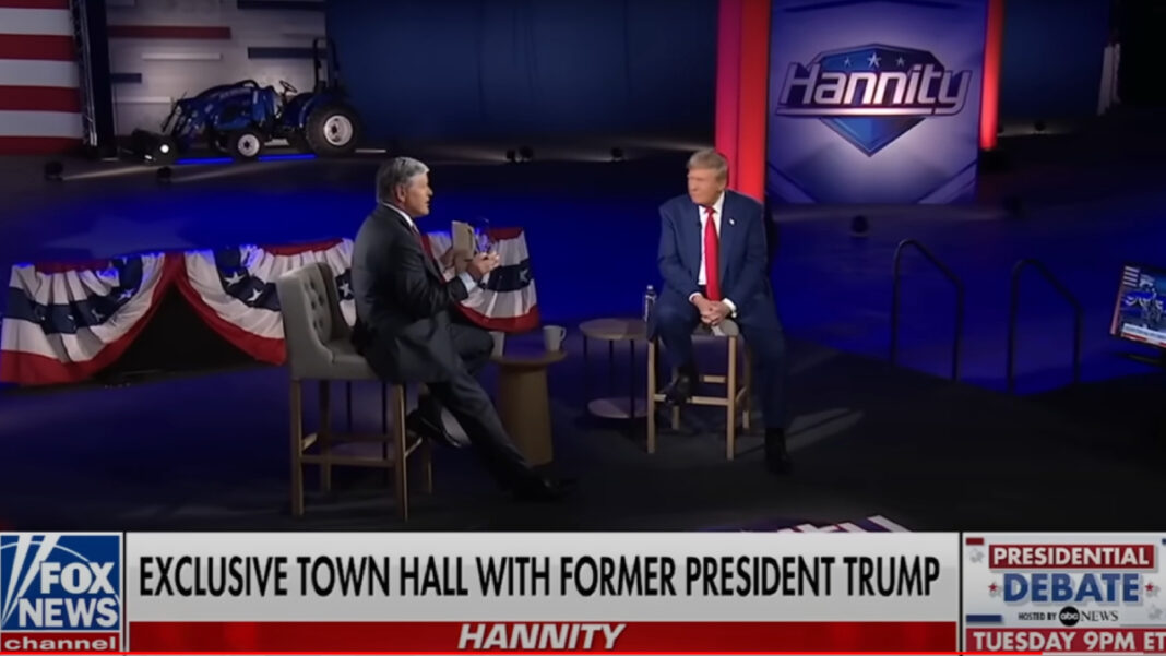 A photo of Sean Hannity interview Donald Trump